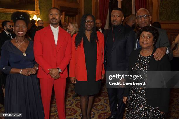 Baroness Floella Benjamin, Michael B. Jordan, Marsha De Cordova MP, Jamie Foxx, Lord Simon Woolley and Baroness Doreen Lawrence attend an evening at...