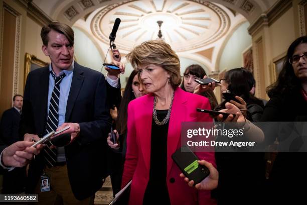 Sen. Lisa Murkowski speaks to reporters as she leaves the weekly Senate Republican policy luncheon at the U.S. Capitol on January 14, 2020 in...