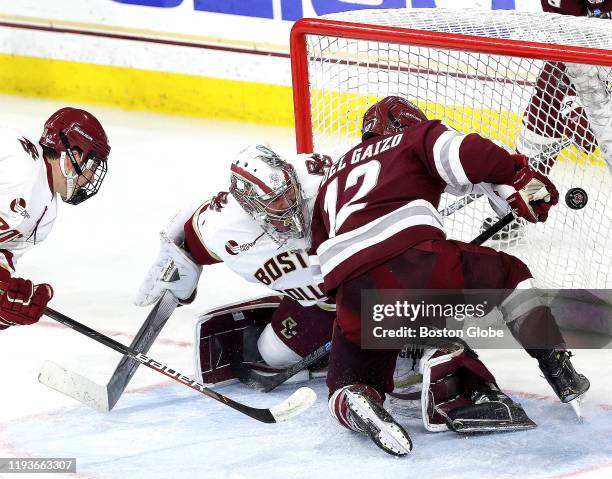 Massachusetts Minutemen forward Anthony Del Gaizo is blocked by Boston College Eagles goalie Spencer Knight during the second period. The Boston...