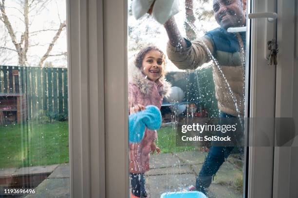 quality time with her father - family cleaning stock pictures, royalty-free photos & images