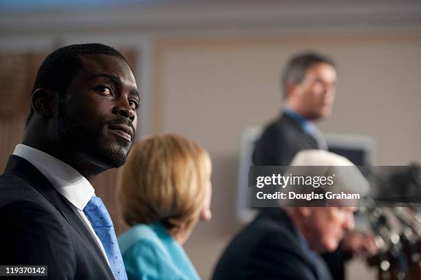 Quarterback Michael Vick; Betty Sutton, D-Ohio; Rep. James Moran, D-Va.; and Wayne Pacelle, president and CEO of the Humane Society of the United...