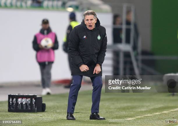 Claude Puel, head coach of AS Saint-Etienne shouts instructions during the UEFA Europa League group I match between VfL Wolfsburg and AS...
