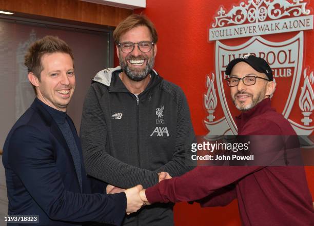 Jurgen Klopp Signs A Contract Extension and chats with Sporting Director Michael Edwards and Mike Gordon FSG President and Liverpool F.C owner at...