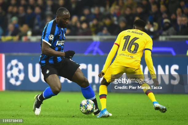Romelu Lukaku of FC Internazionale competes for the ball with Moussa Wague of FC Barcelona during the UEFA Champions League group F match between...