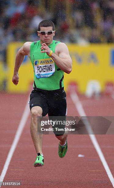 Craig Pickering of Great Britain in action in the Men's 100 metres heats during the Aviva Grand Prix at Alexander Stadium on July 10, 2011 in...