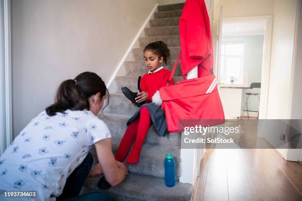 getting the right foot ready - school routine stock pictures, royalty-free photos & images