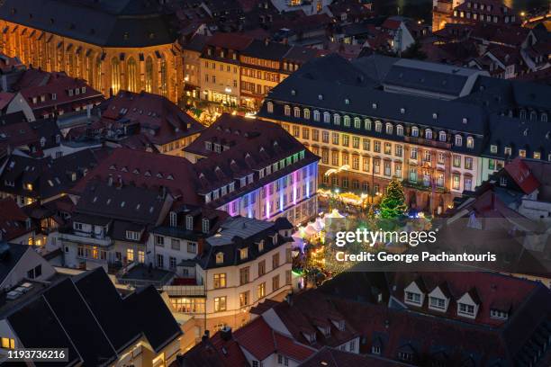 high angle view of christmas market in heidelberg - heidelberg germany stock-fotos und bilder