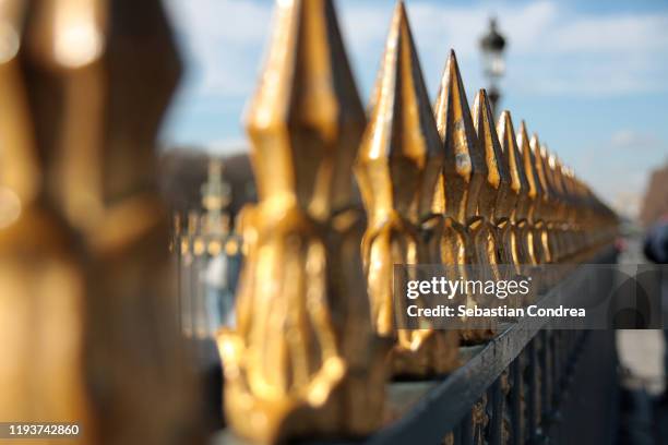 opulent gates opening onto champs-elysee, paris, france - elysee palace stock-fotos und bilder