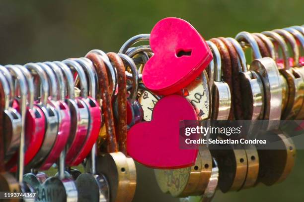 love overload - hundreds of love padlocks building one giant metal heart, travel malaysia - kärlekslås bildbanksfoton och bilder