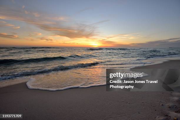 small waves on the sand - panama city beach imagens e fotografias de stock