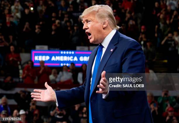 President Donald Trump arrives for a "Keep America Great" campaign rally in Milwaukee, Wisconsin, January 14, 2020.
