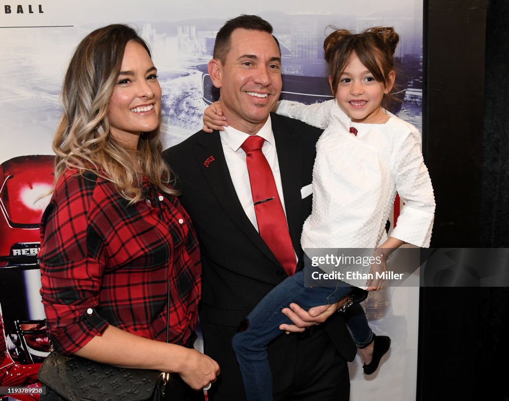Kelly Arroyo, Marcus Arroyo and their daughter Cruz Arroyo pose after