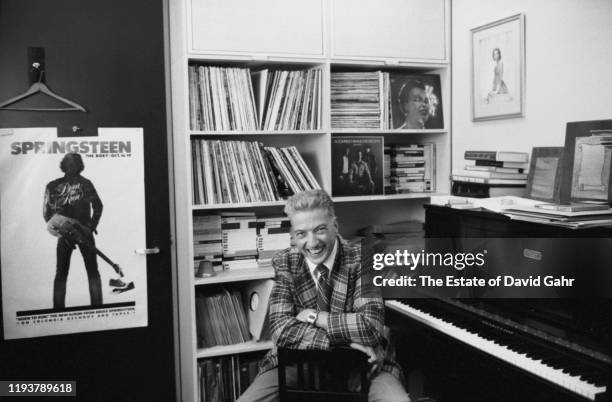 American record producer, civil rights activist, and music critic John Hammond poses for a portrait in his offices at Columbia Records on November...