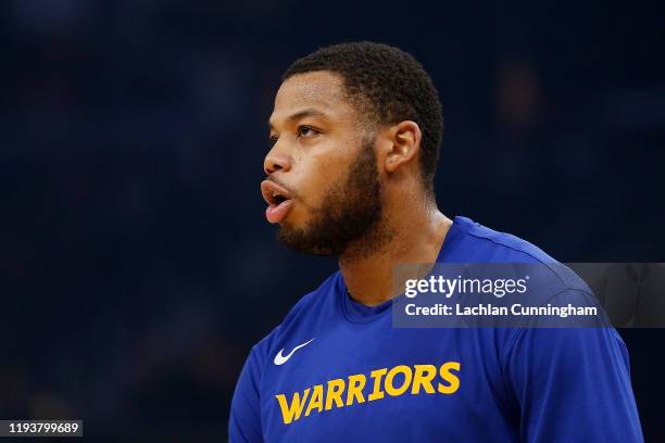 Omari Spellman of the Golden State Warriors warms up before the game against the Memphis Grizzlies at Chase Center on December 09, 2019 in San...