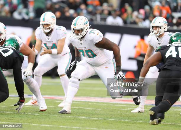 Julie'n Davenport of the Miami Dolphins in action against the New York Jets during their game at MetLife Stadium on December 08, 2019 in East...