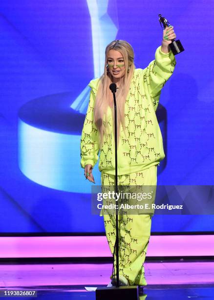 Tana Mongeau accepts an award onstage during The 9th Annual Streamy Awards on December 13, 2019 in Los Angeles, California.