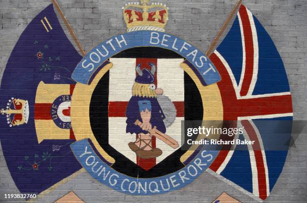 Loyalist mural for the 'South Belfast Young Conquerors' including an image of an ancient warrior armed with shield and sword plus the emblem of the...