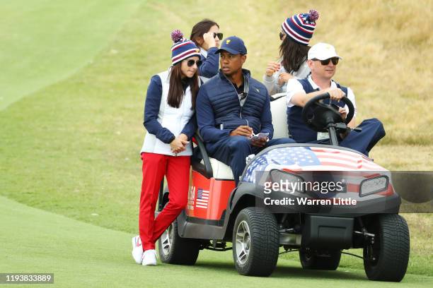 Playing Captain Tiger Woods of the United States team, girlfriend Erica Herman, girlfriend of Justin Thomas of the United States team, Jillian...