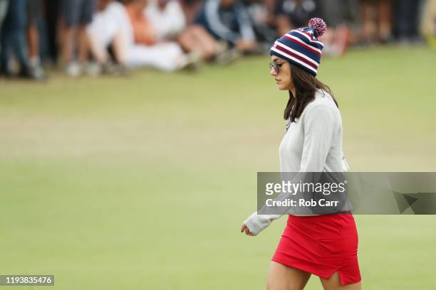 Girlfriend of Rickie Fowler of the United States team, Allison Stokke, walks on the tenth hole during Saturday afternoon foursomes matches on day...