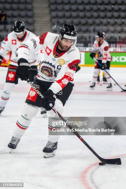 Joel Lundqvist of Frolunda HF controls the puck during warm-up prior to the second quarter-finals game between EHC Biel-Bienne and Frolunda Indians...