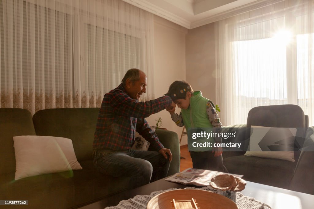 Hand kissing ceremony in Bayram