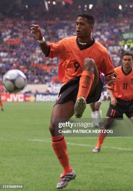 Dutch forward Patrick Kluivert kicks the ball during the Euro-2000 Group D first round match between France and The Netherlands, 21 June 2000 at the...