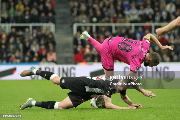 Aaron Wilbraham of Rochdale battles with Sean Longstaff of Newcastle United during the FA Cup match between Newcastle United and Rochdale at St....