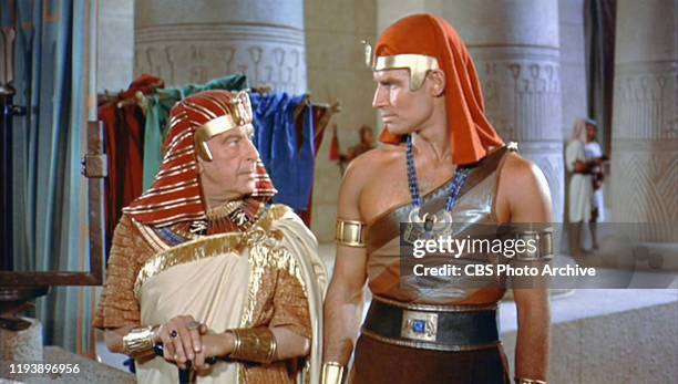 The epic movie "The Ten Commandments", directed by Cecil B. DeMille. Seen here from left, Cedric Hardwicke as Sethi and Charlton Heston as Moses....