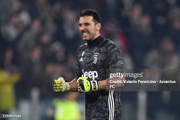 Juventus' goalkeeper Gianluigi Buffon celebrates after the opening goal of his teammate Gonzalo Higuain during the Coppa Italia match between...