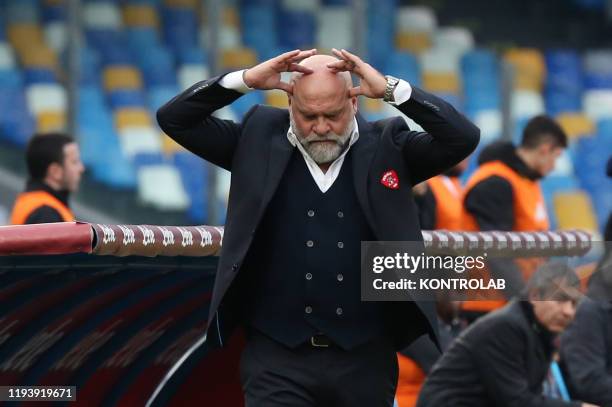 Perugia's Italian coach Serse Cosmi gestures during the Tim Italy Cup round of 16 football match SSC Napoli vs AC Perugia. Napoli won 2-0.