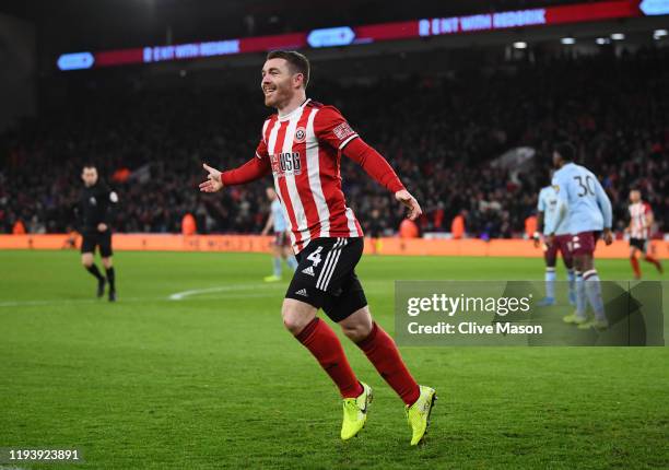 John Fleck of Sheffield United celebrates after scoring his team's first goal during the Premier League match between Sheffield United and Aston...
