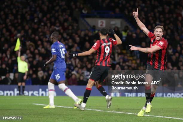Assistant referee raises his flag for offside against Dan Gosling of Bournemouth who has just scored but VAR rules it a goal during the Premier...