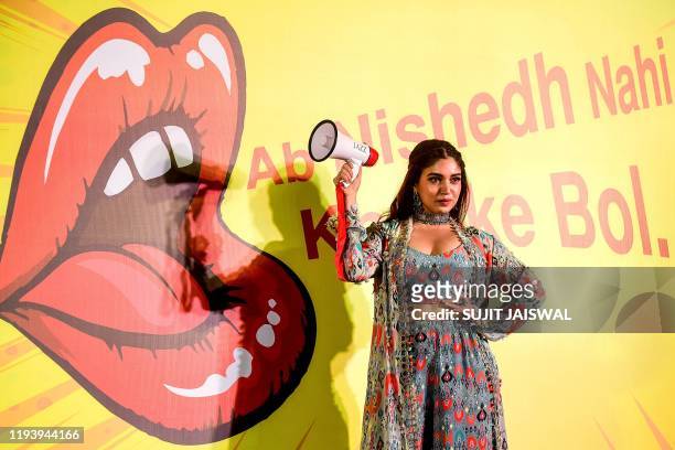 Bollywood actress Bhumi Pednekar poses for photographs during the launch of MTV's short form video relating to the new drama series 'Nishedh' in...
