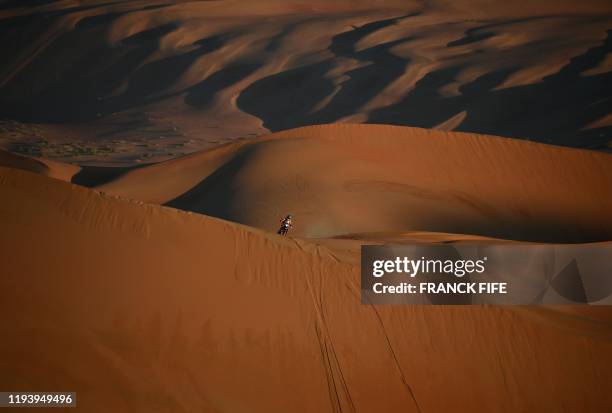 Australia's Toby Price powers his KTM motorbike during the Stage 11 of the Dakar 2020 between Shubaytah and Haradh, Saudi Arabia, on January 16, 2020.