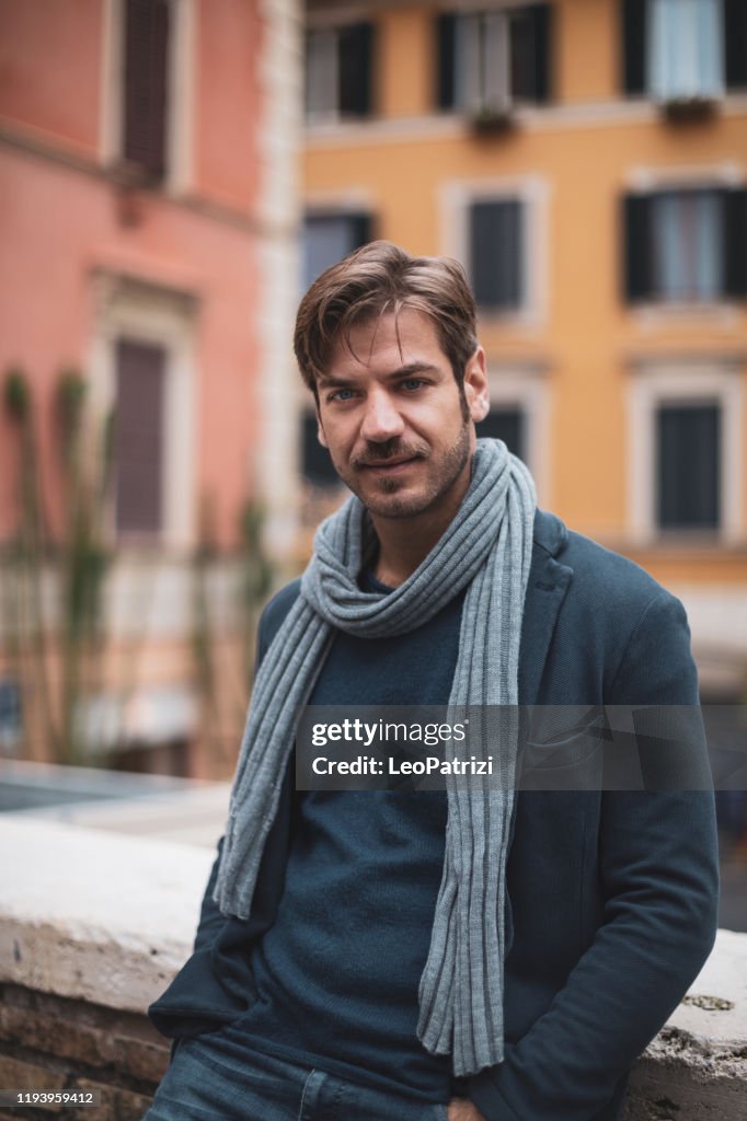 30ish years old man portrait in Rome city streets