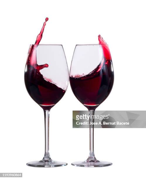 raising a toast of red wines on a white background. - glass half full party stock pictures, royalty-free photos & images