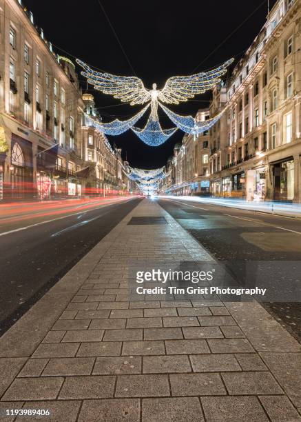 regent street, london at christmas, uk. - regent street christmas lights stock pictures, royalty-free photos & images