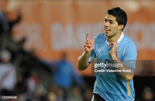 July 19: Luis Suarez, form Uruguay, celebrates his second goal after scoring against Uruguay during 2011 Copa America soccer match as part of...