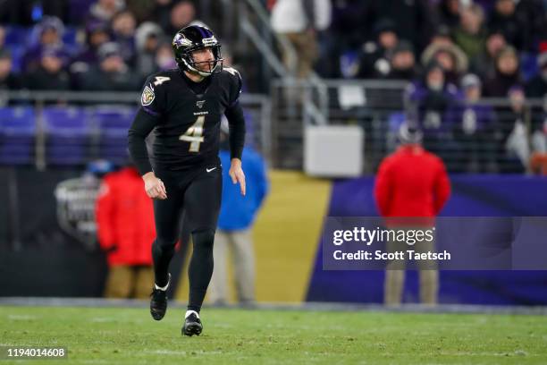 Sam Koch of the Baltimore Ravens in action after punting the ball during the second half of the game against the New York Jets at M&T Bank Stadium on...