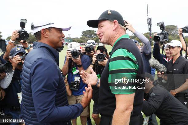 Playing Captain Tiger Woods of the United States team and Captain Ernie Els of South Africa and the International team shake hands after The United...
