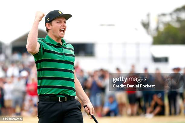 Cameron Smith of Australia and the International team celebrates defeating Justin Thomas of the United States team 2&1 during Sunday Singles matches...