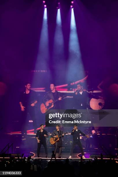 Nick Jonas, Kevin Jonas and Joe Jonas perform onstage at 'Jonas Brothers in Concert' at The Forum on December 14, 2019 in Inglewood, California.
