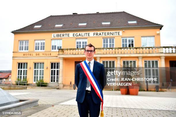 French mayor of Florange Remy Dick, aged 25, poses in front of the City Hall of Florange, eastern France, on January 11, 2020.