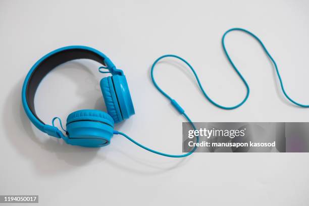 headphones on a white background - wire stock pictures, royalty-free photos & images