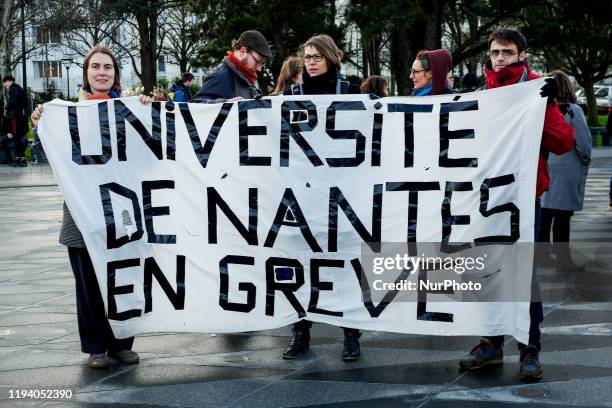 Students holding a banner at the demonstration against retirement reform in Nantes, France, 16 January 2020.