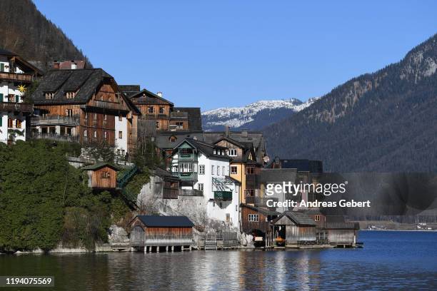 General view of the town center on January 16, 2019 in Hallstatt, Austria. Hallstatt, known for its picturesque beauty and its location at the base...