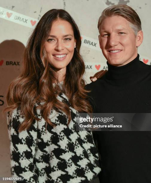 January 2020, Berlin: Bastian Schweinsteiger, national soccer player, and his wife Ana Ivanovic at a customer event of the label Brax in the building...