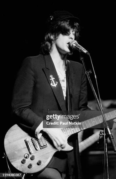 Scottish musician Mike Scott, of the group the Waterboys, plays guitar as he performs onstage at the Metro, Chicago, Illinois, November 5, 1985.