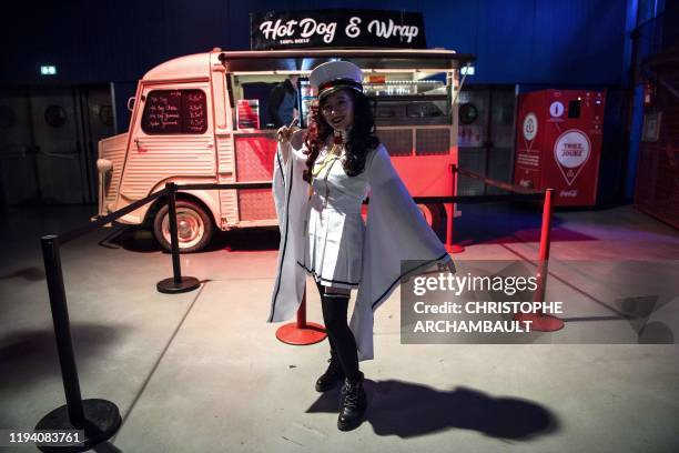 Dressed-up fan poses ahead of Japanese virtual singer Hatsune Miku concert at the Zenith concerthall, in Paris, on January 16, 2020.