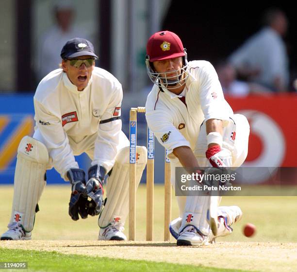 Russell Warren Model Northamptonshire's Russell Warren sweeps the ball during a Cricinfo ...